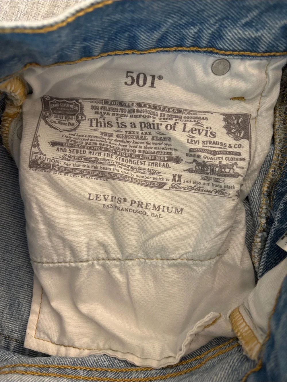 Levi's Light Blue Distressed Straight Leg Jeans